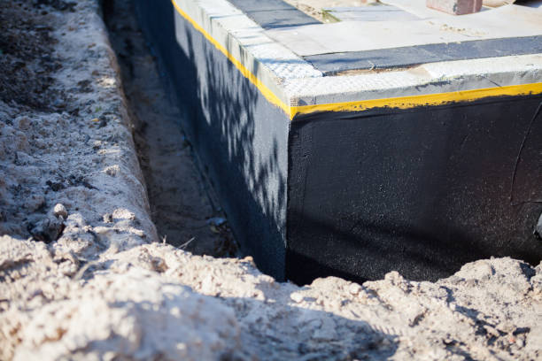 Professional Exterior Waterproofing technician working in Bayonne, NJ